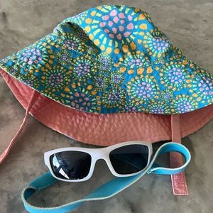 Patagonia baby sun bucket hat and mud pie sunglasses.